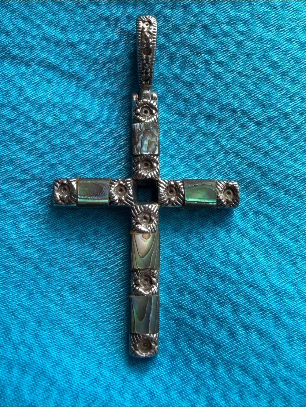 Sterling silver vintage with Abalone Inlay Crucifix
Iridescent green/blue